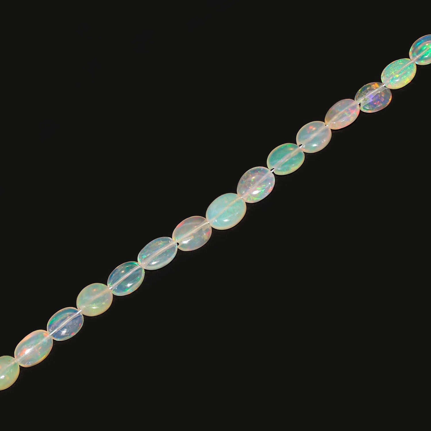 Ethiopian Opal 4x3mm To 8x6mm Oval Smooth Beads (15 Inch)