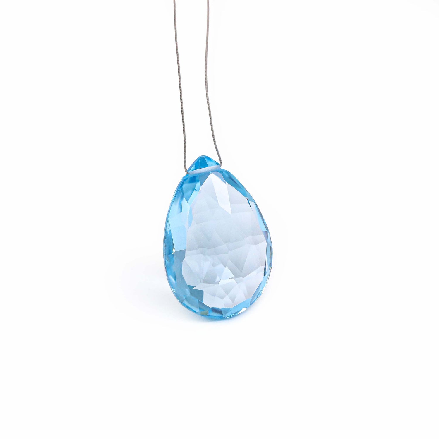 Swiss Blue Topaz 24.50x17.50mm to 27x20mm Pear Briolette (Side Drill)