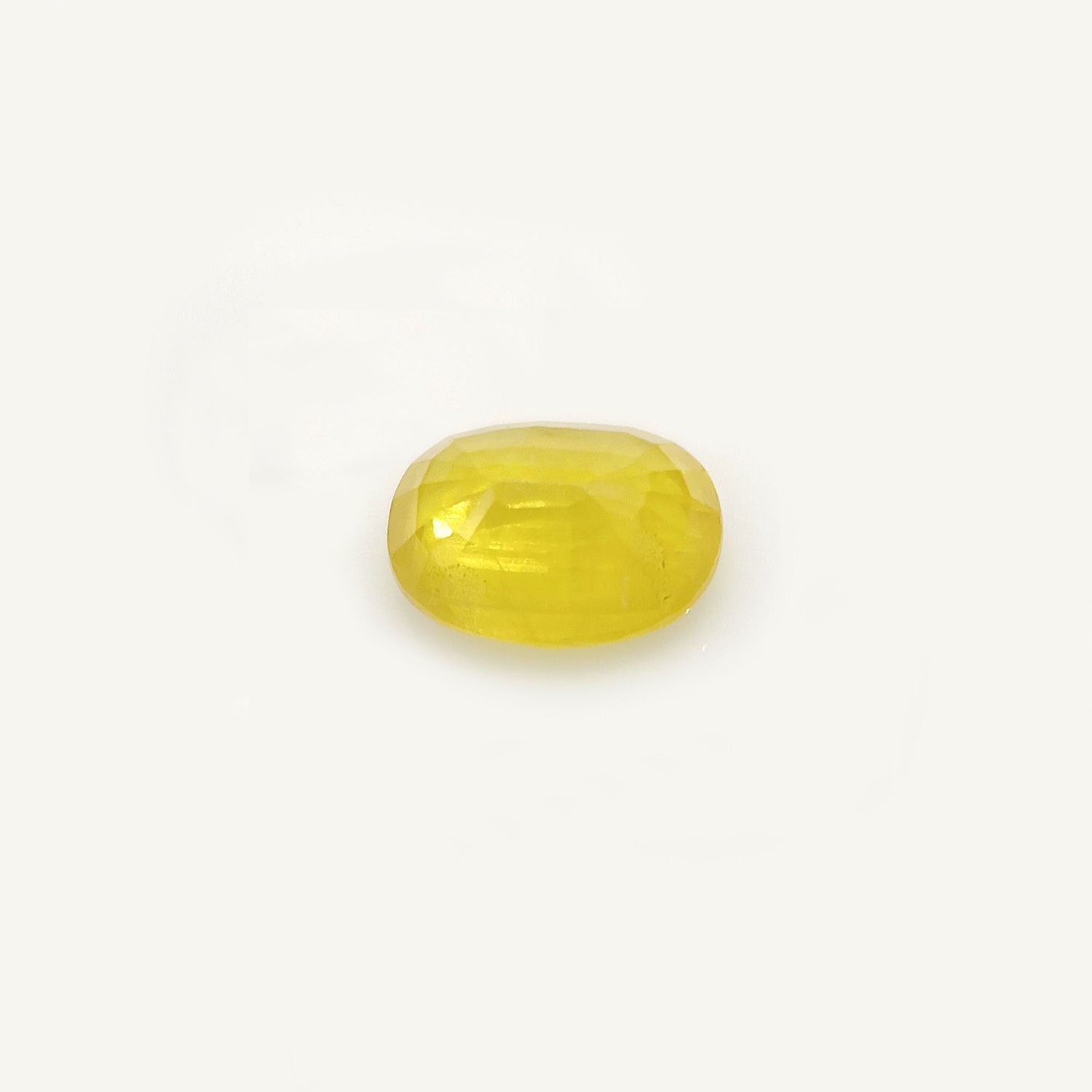 Natural Yellow Sapphire (Nigeria) (Heated) Oval Faceted (4.27 Cts. / 4.50 Ratti)