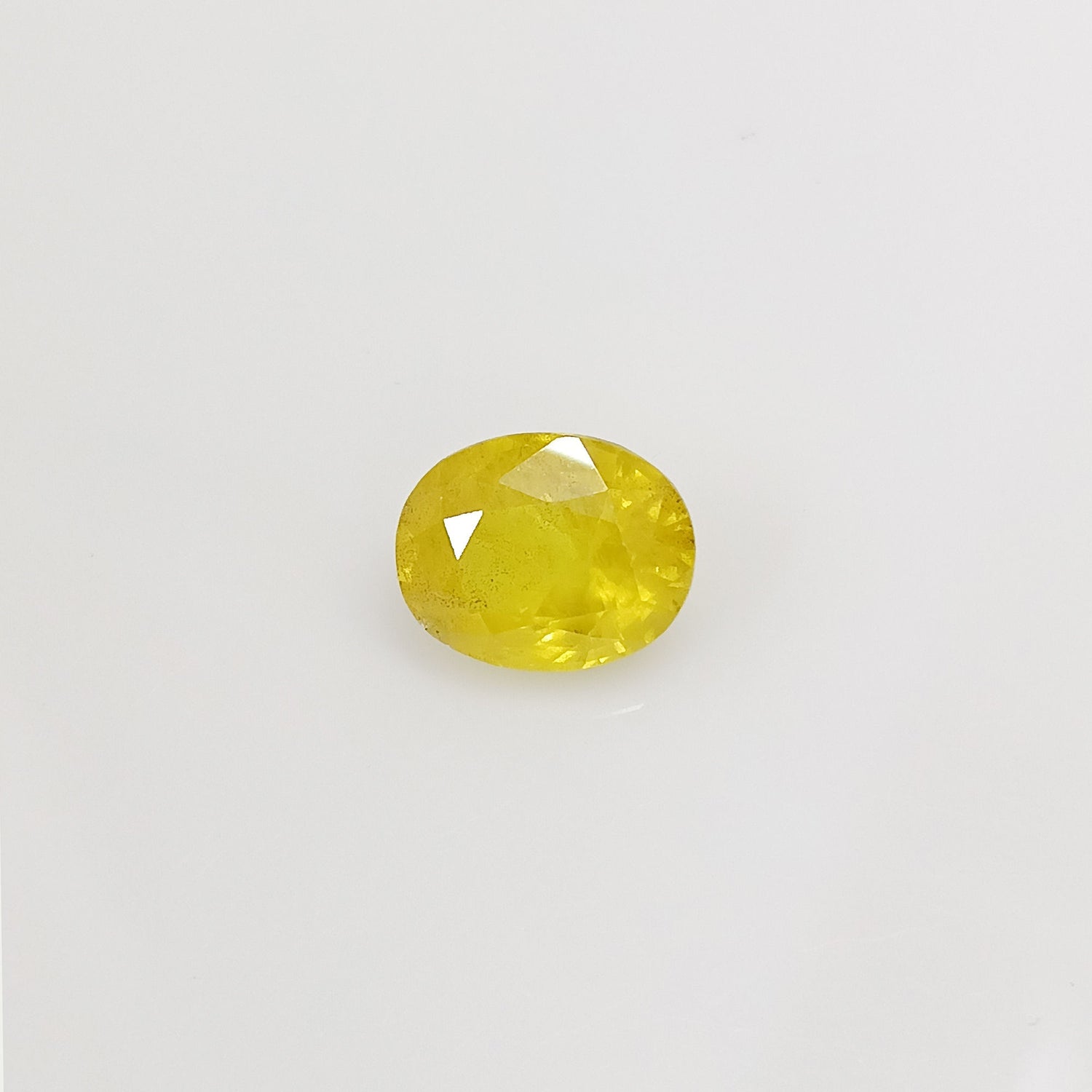 Natural Yellow Sapphire (Nigeria) (Heated) Oval Faceted (4.32 Cts. / 4.75 Ratti)