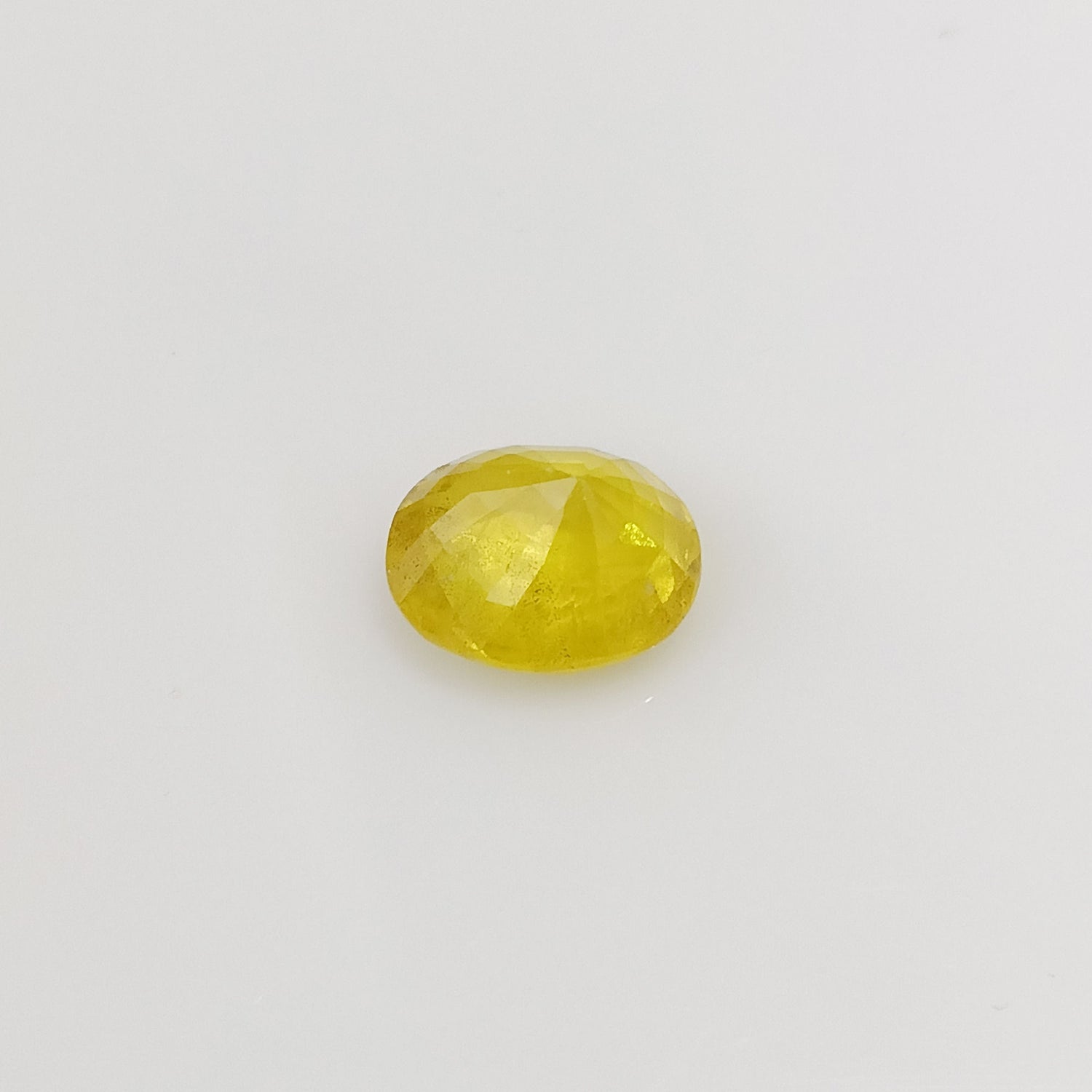 Natural Yellow Sapphire (Nigeria) (Heated) Oval Faceted (4.32 Cts. / 4.75 Ratti)