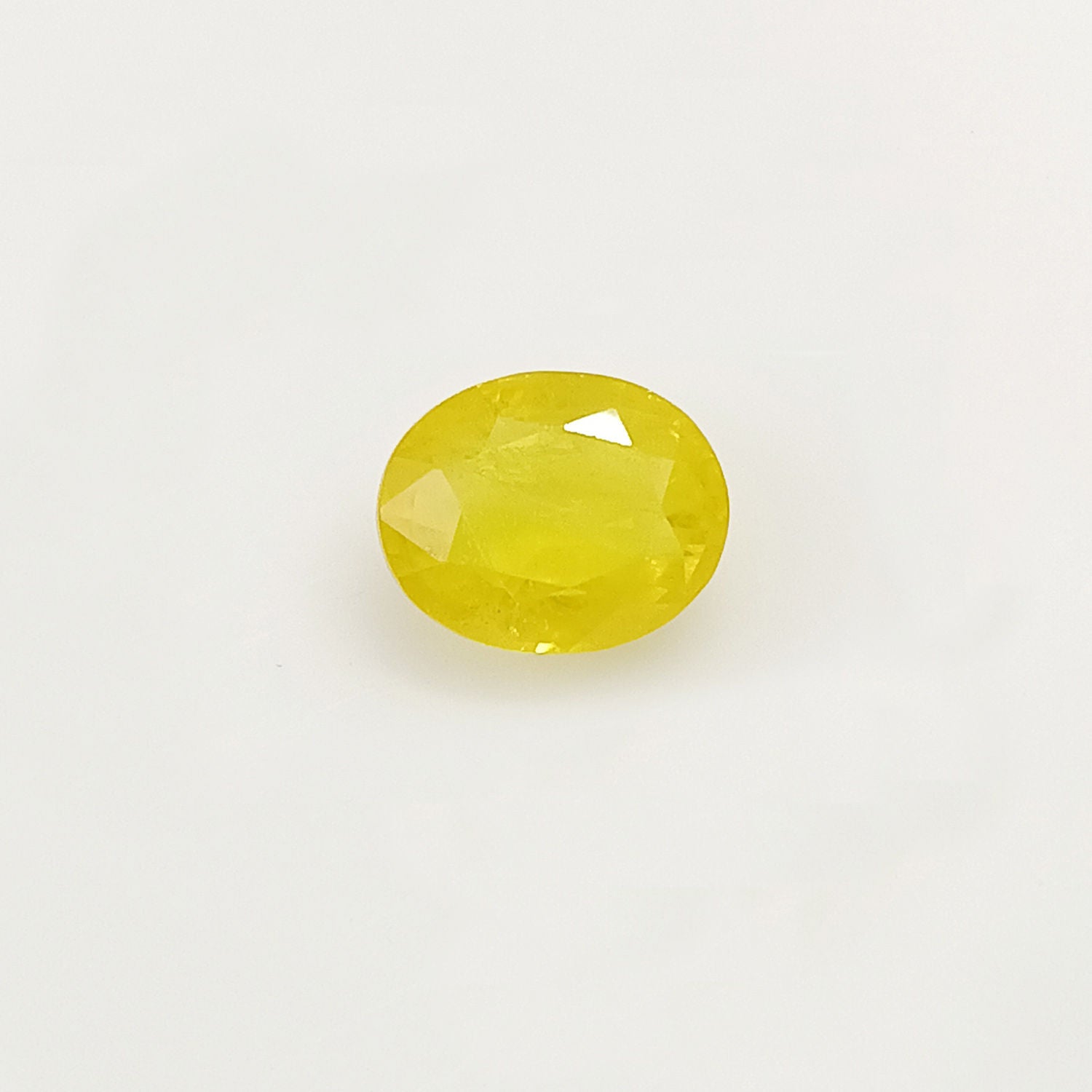 Natural Yellow Sapphire (Nigeria) (Heated) Oval Faceted (4.53 Cts. / 5 Ratti)