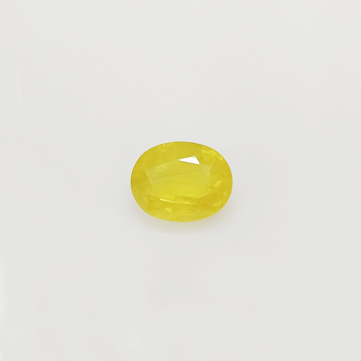 Natural Yellow Sapphire (Nigeria) (Heated) Oval Faceted (4.79 Cts. / 5.25 Ratti)