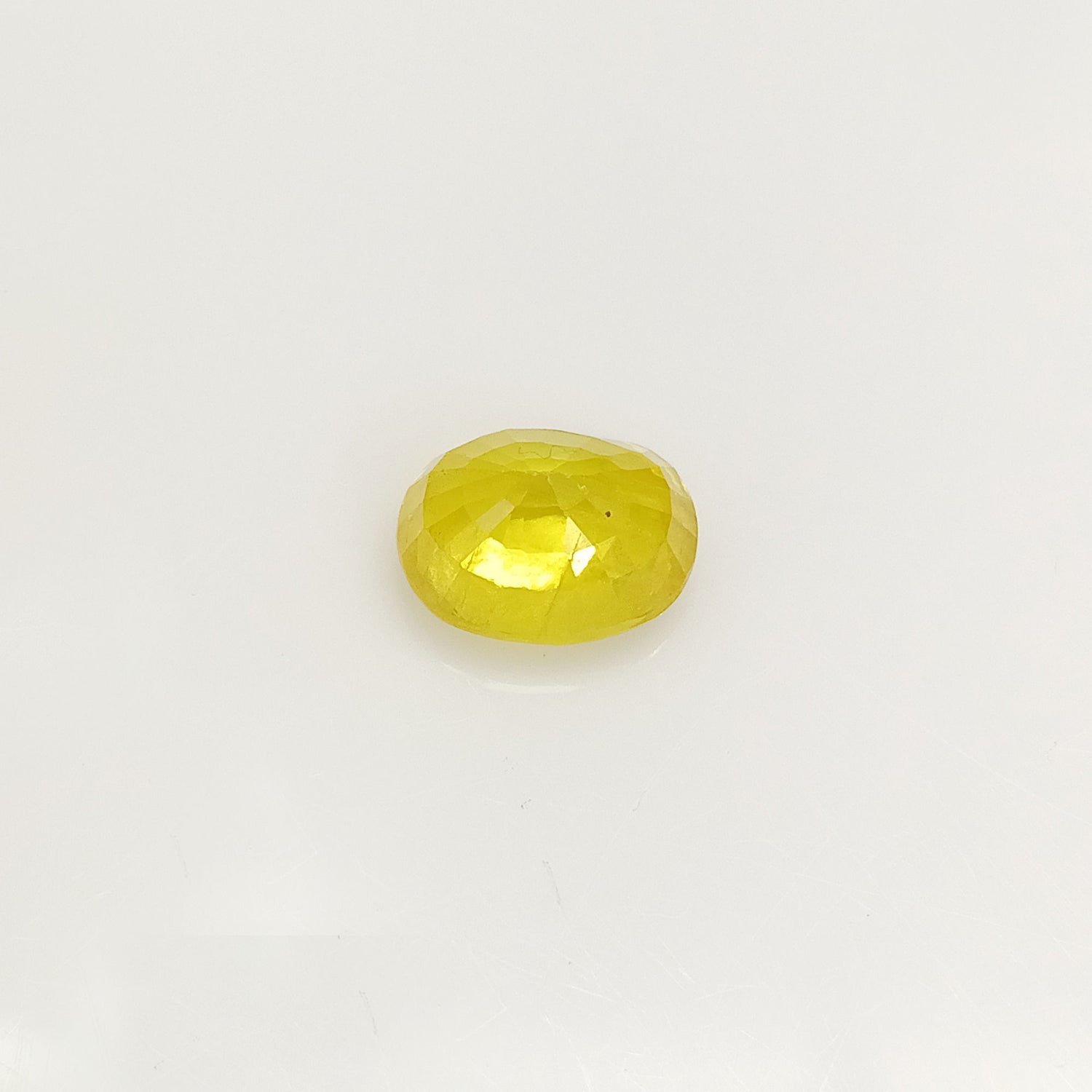 Natural Yellow Sapphire (Nigeria) (Heated) Oval Faceted (4.89 Cts. / 5.25 Ratti)