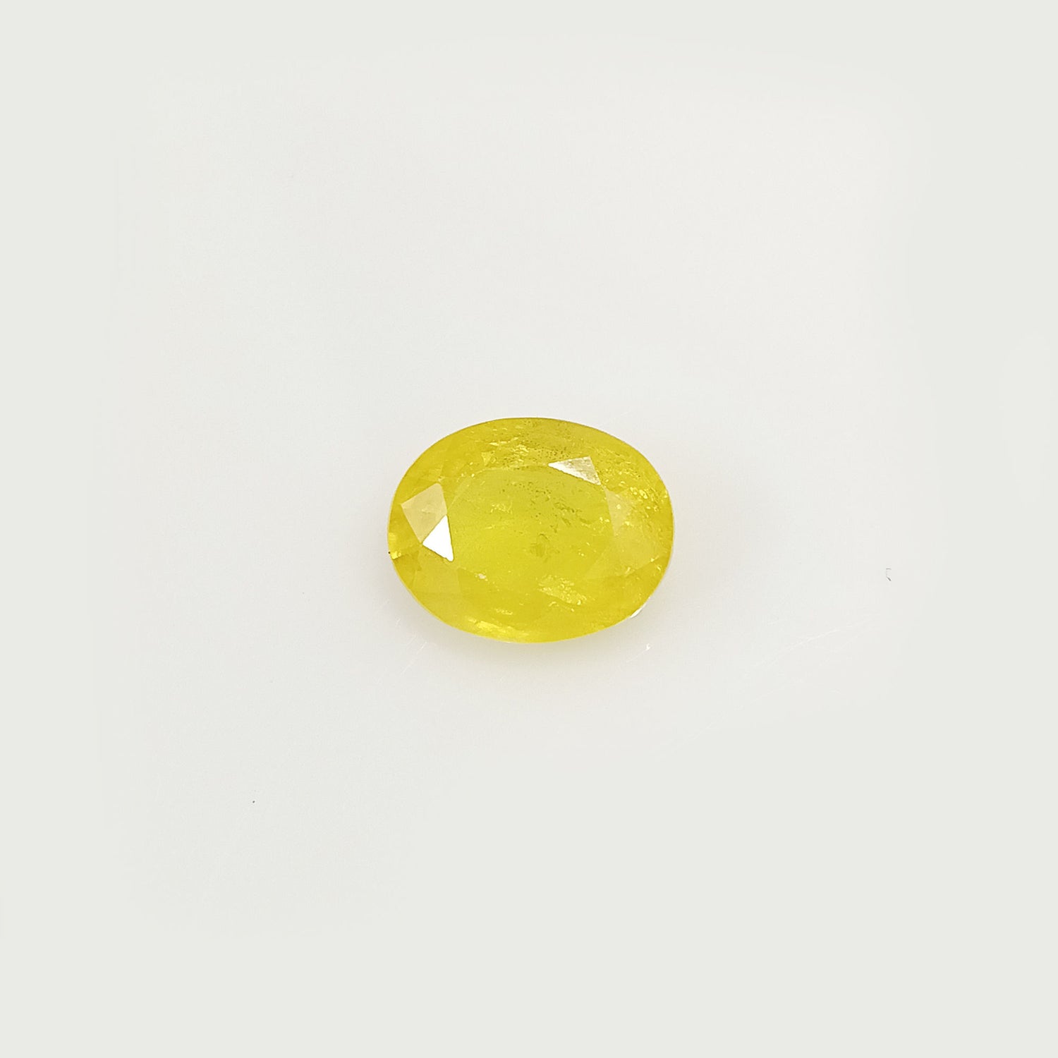 Natural Yellow Sapphire (Nigeria) (Heated) Oval Faceted (4.94 Cts. / 5.50 Ratti)