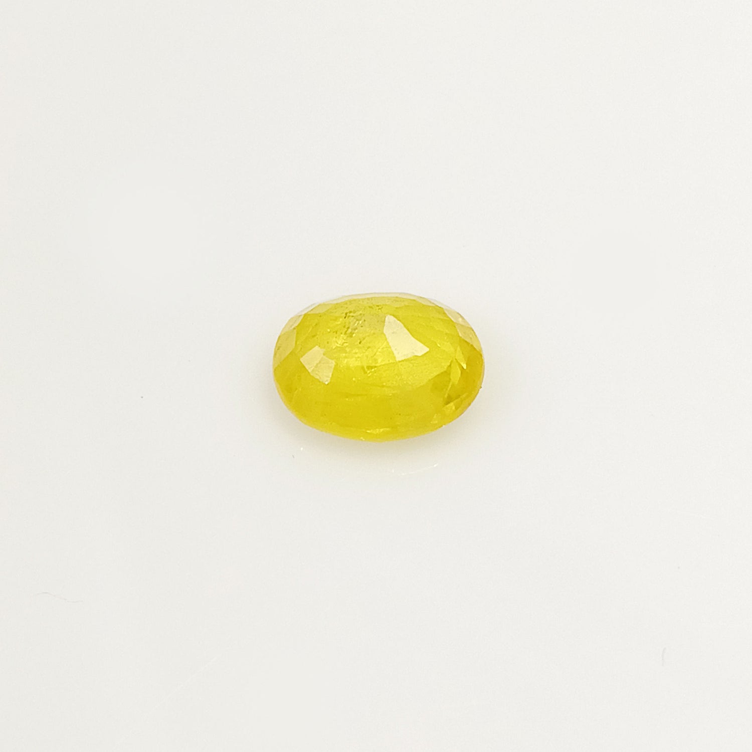 Natural Yellow Sapphire (Nigeria) (Heated) Oval Faceted (4.94 Cts. / 5.50 Ratti)