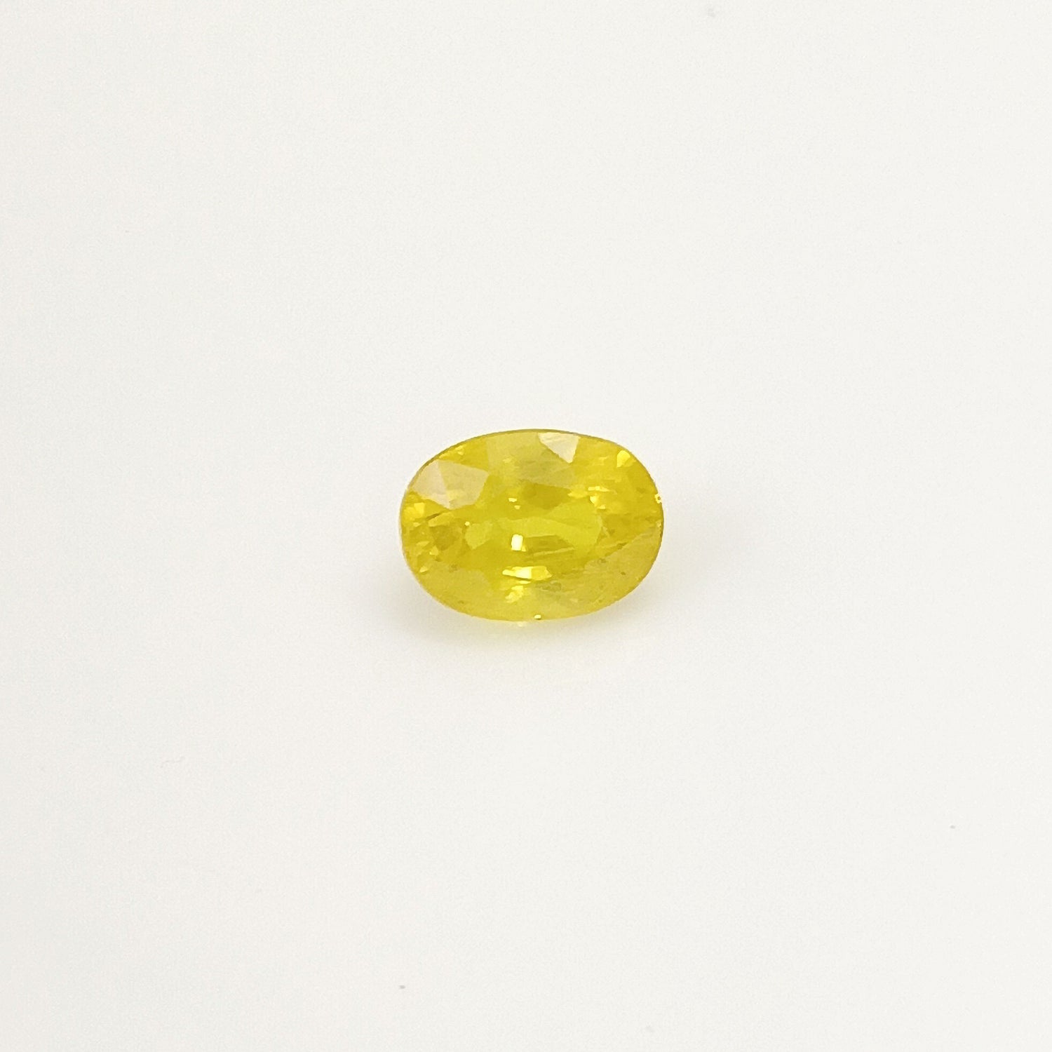 Natural Yellow Sapphire (Nigeria) (Heated) Oval Faceted (4.95 Cts. / 5.50 Ratti)