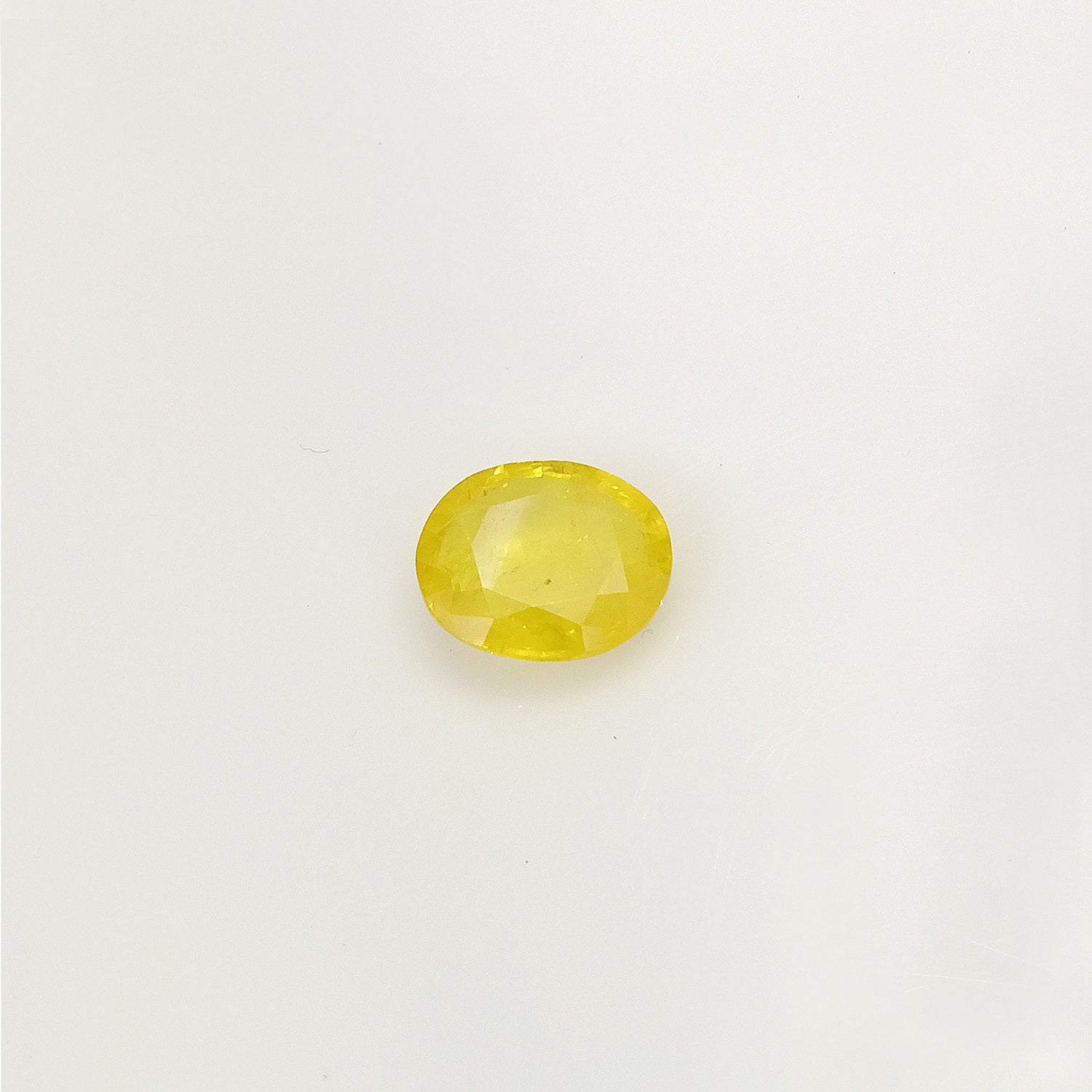 Natural Yellow Sapphire (Nigeria) (Heated) Oval Faceted (4.99 Cts. / 5.50 Ratti)