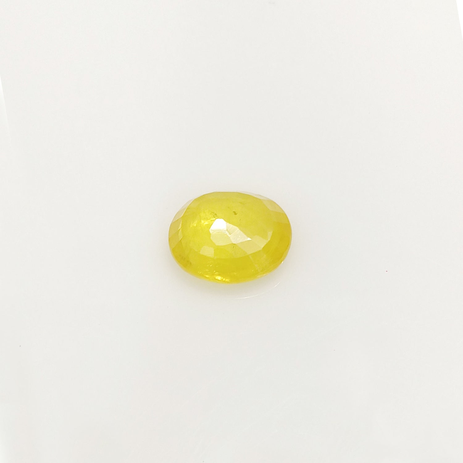 Natural Yellow Sapphire (Nigeria) (Heated) Oval Faceted (4.99 Cts. / 5.50 Ratti)