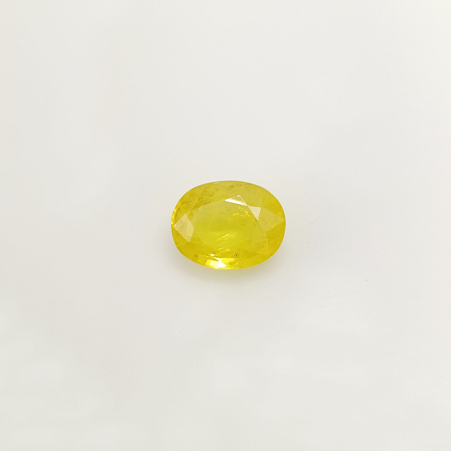 Natural Yellow Sapphire (Nigeria) (Heated) Oval Faceted (5.03 Cts. / 5.50 Ratti)