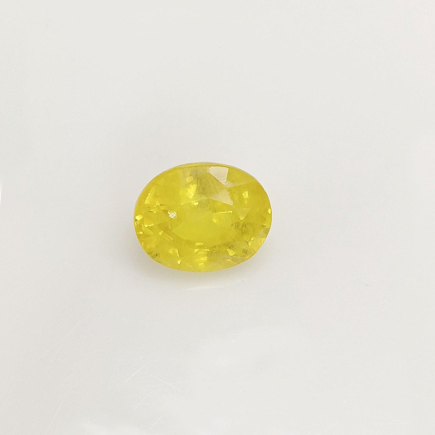 Natural Yellow Sapphire (Nigeria) (Heated) Oval Faceted (5.11 Cts. / 5.50 Ratti)