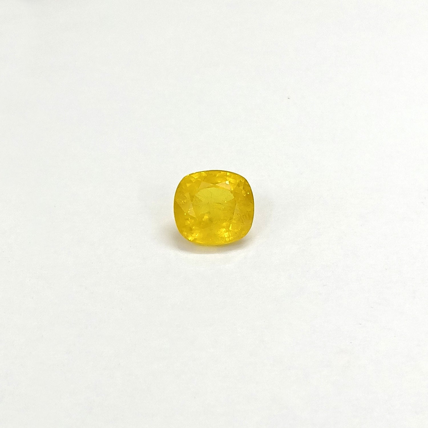 Natural Yellow Sapphire (Nigeria) (Heated) Cushion Faceted (5.18 Cts. / 5.50 Ratti)