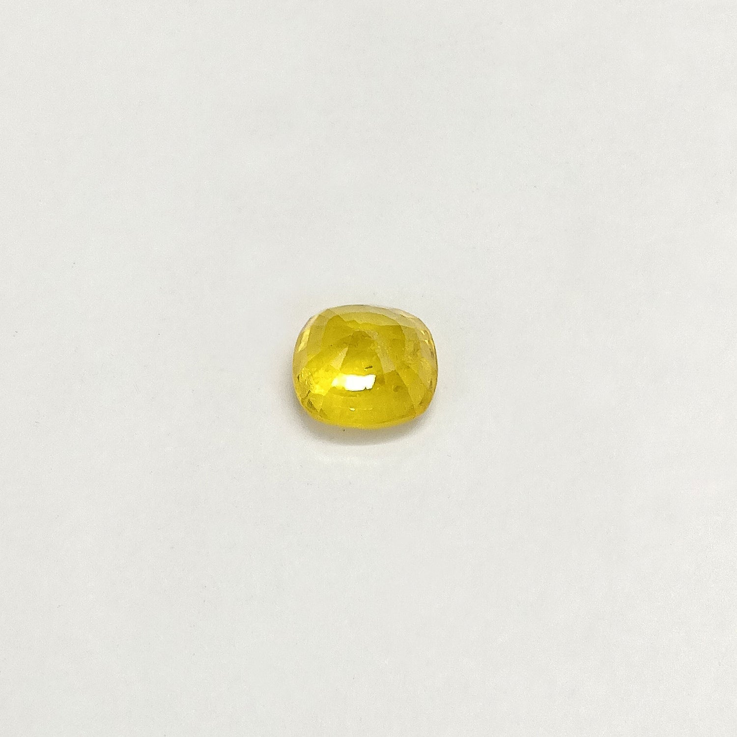 Natural Yellow Sapphire (Nigeria) (Heated) Cushion Faceted (5.18 Cts. / 5.50 Ratti)