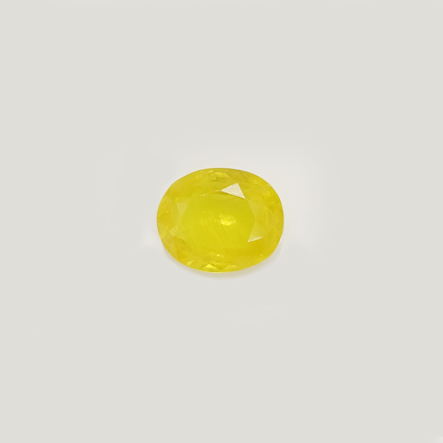 Natural Yellow Sapphire (Nigeria) (Heated) Oval Faceted (5.20 Cts. / 5.75 Ratti)