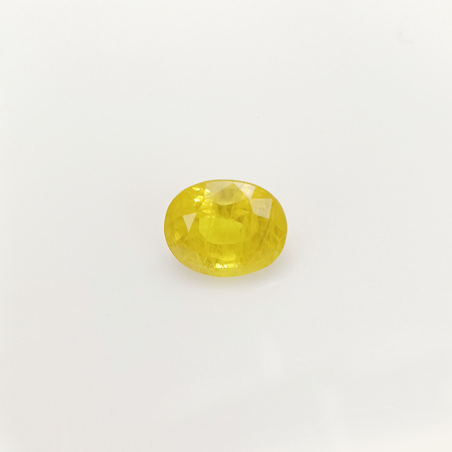 Natural Yellow Sapphire (Nigeria) (Heated) Oval Faceted (5.29 Cts. / 5.75 Ratti)