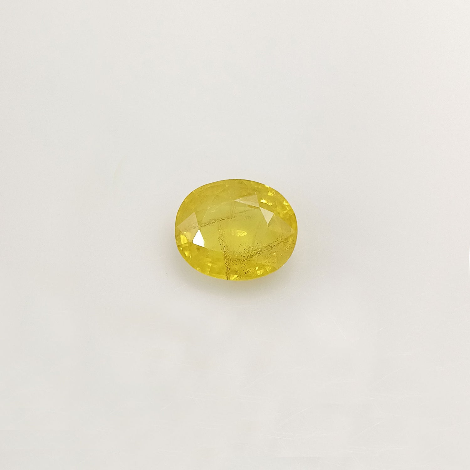 Natural Yellow Sapphire (Nigeria) (Heated) Oval Faceted (5.38 Cts. / 6 Ratti)