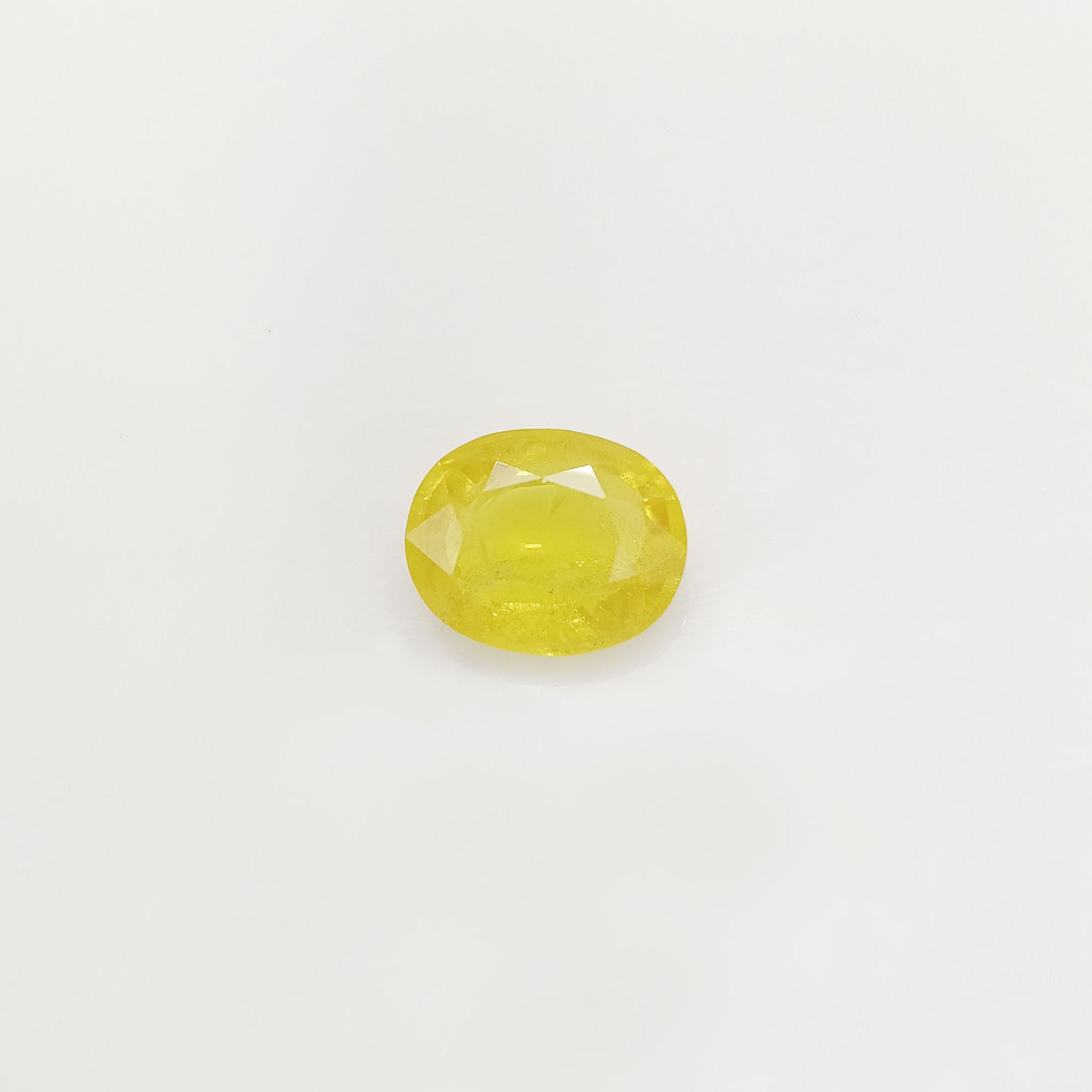 Natural Yellow Sapphire (Nigeria) (Heated) Oval Faceted (5.46 Cts. / 6 Ratti)
