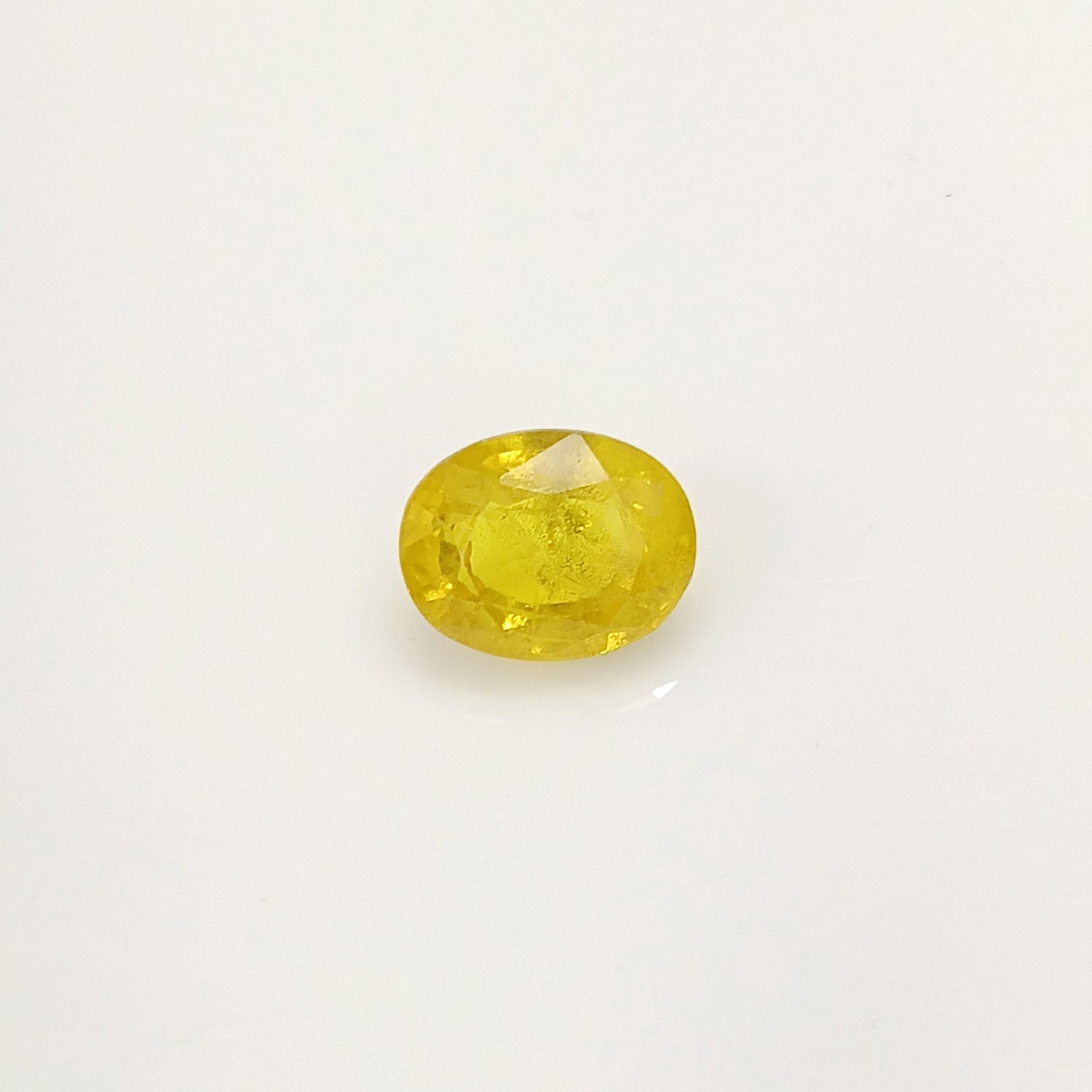 Natural Yellow Sapphire (Nigeria) (Heated) Oval Faceted (5.50 Cts. / 6 Ratti)