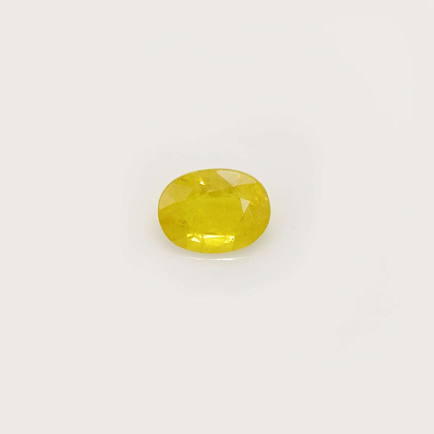 Natural Yellow Sapphire (Nigeria) (Heated) Oval Faceted (5.51 Cts. / 6 Ratti)