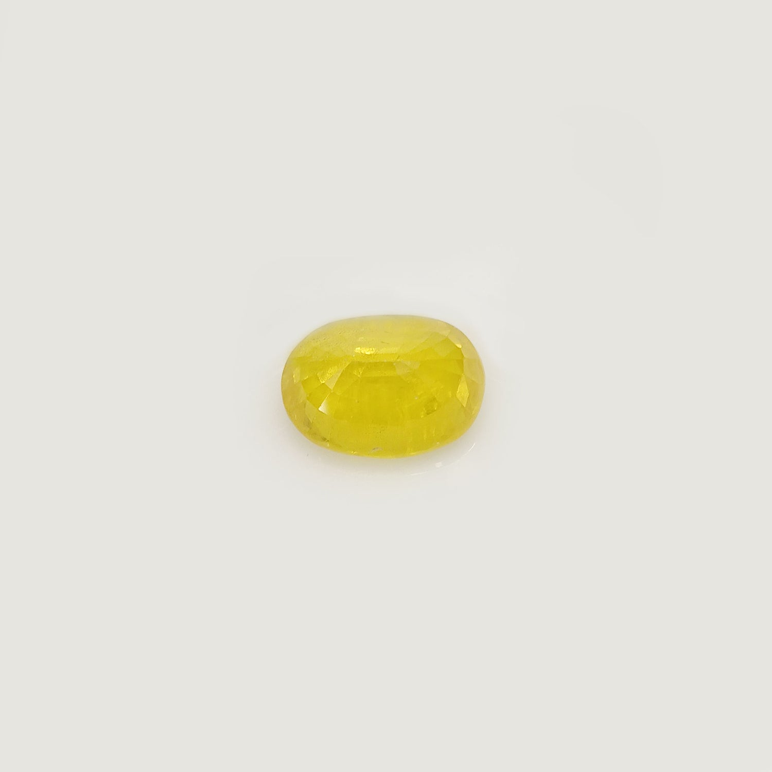 Natural Yellow Sapphire (Nigeria) (Heated) Oval Faceted (5.51 Cts. / 6 Ratti)