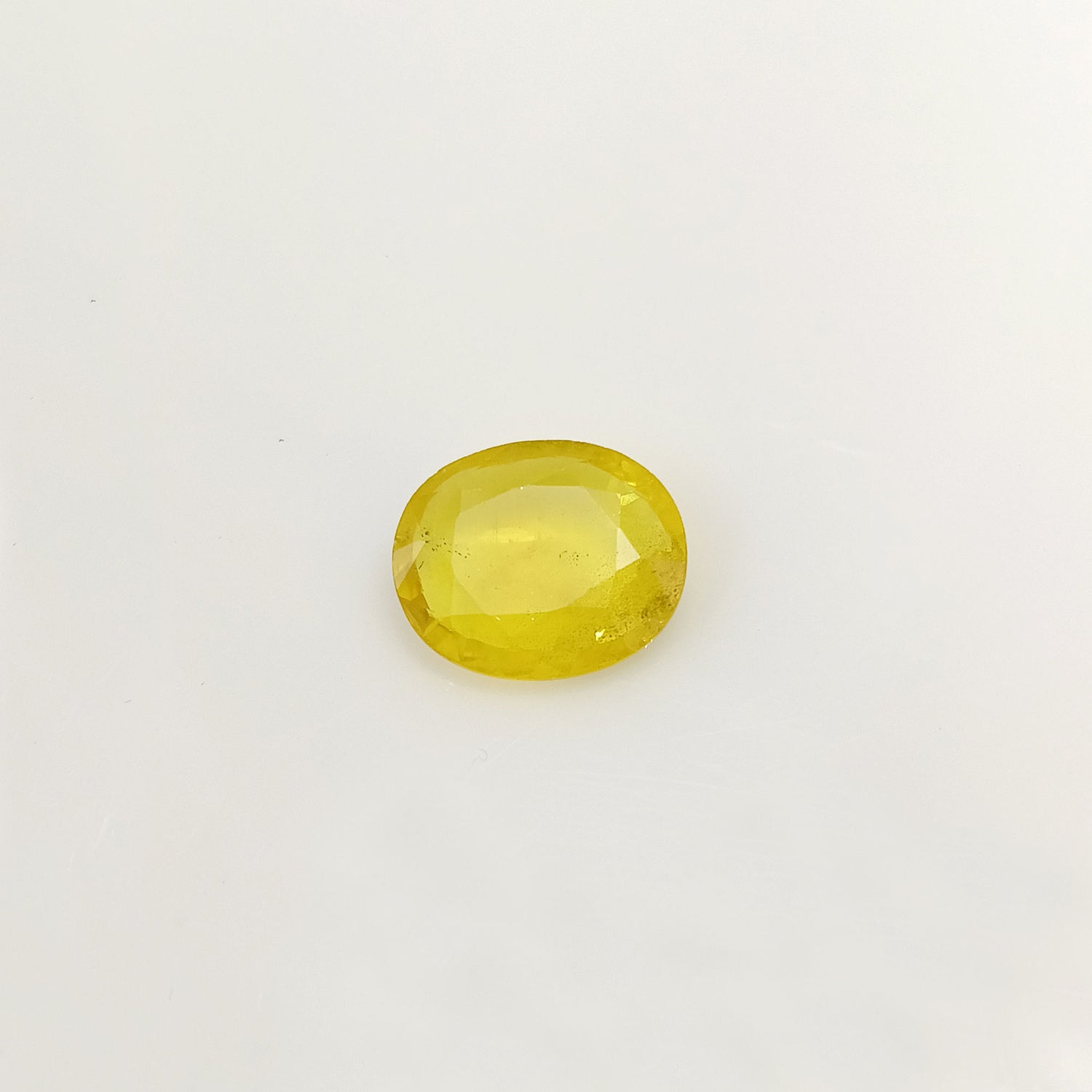 Natural Yellow Sapphire (Nigeria) (Heated) Oval Faceted (5.63 Cts. / 6 Ratti)