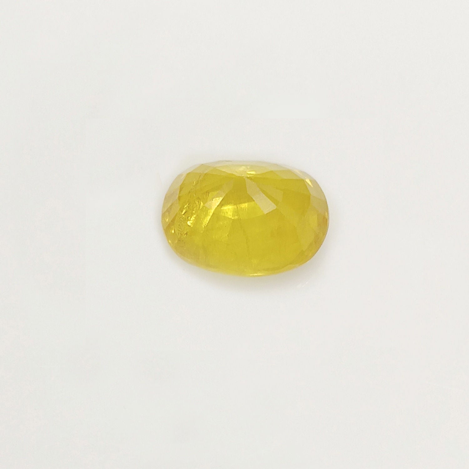 Natural Yellow Sapphire (Nigeria) (Heated) Oval Faceted (5.73 Cts. / 6.25 Ratti)
