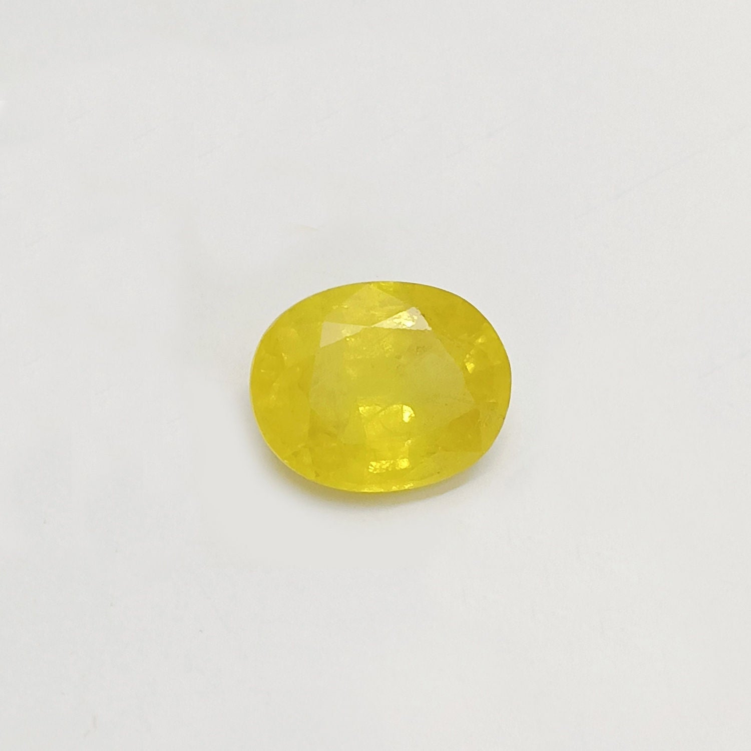 Natural Yellow Sapphire (Nigeria) (Heated) Oval Faceted (5.77 Cts. / 6.25 Ratti)