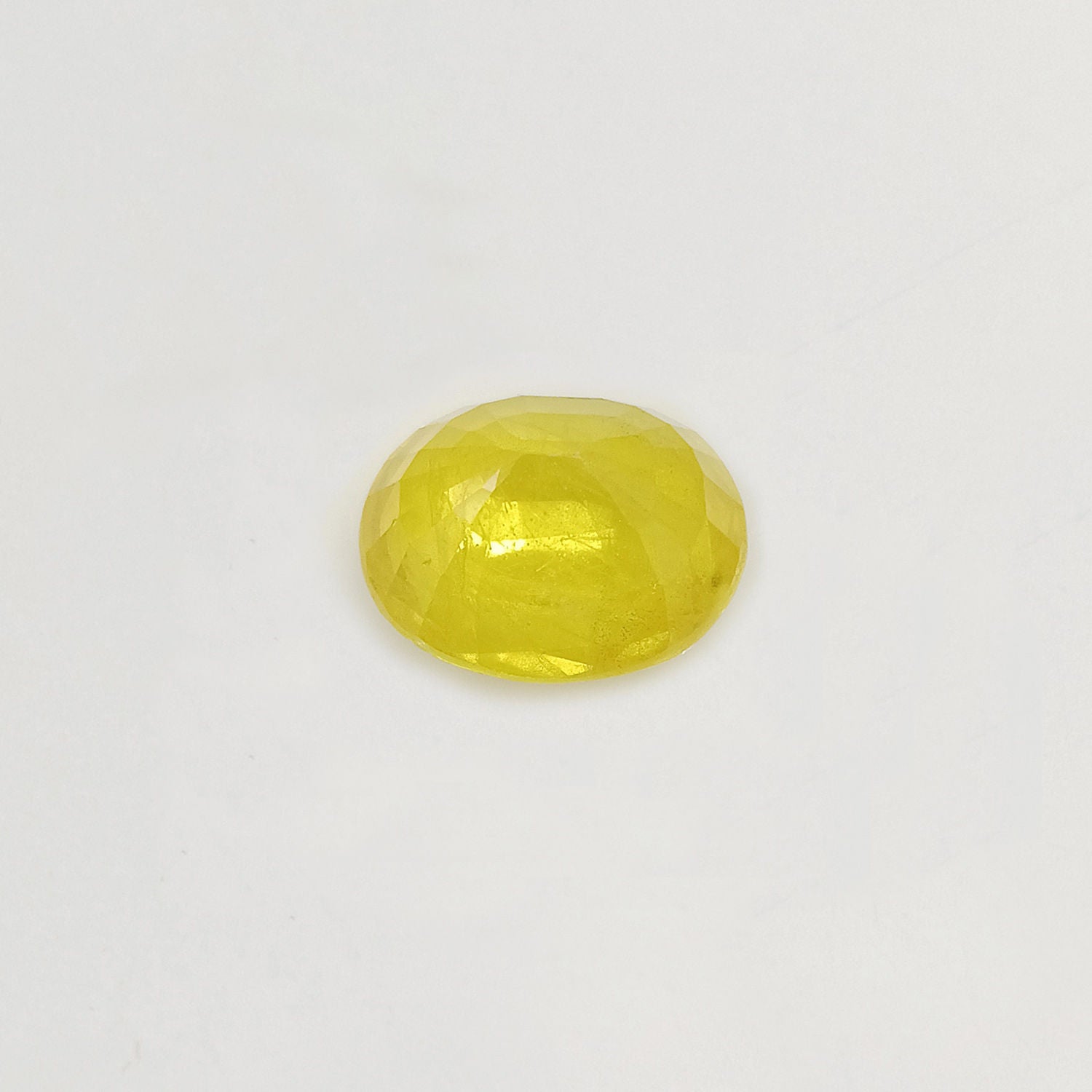 Natural Yellow Sapphire (Nigeria) (Heated) Oval Faceted (5.77 Cts. / 6.25 Ratti)
