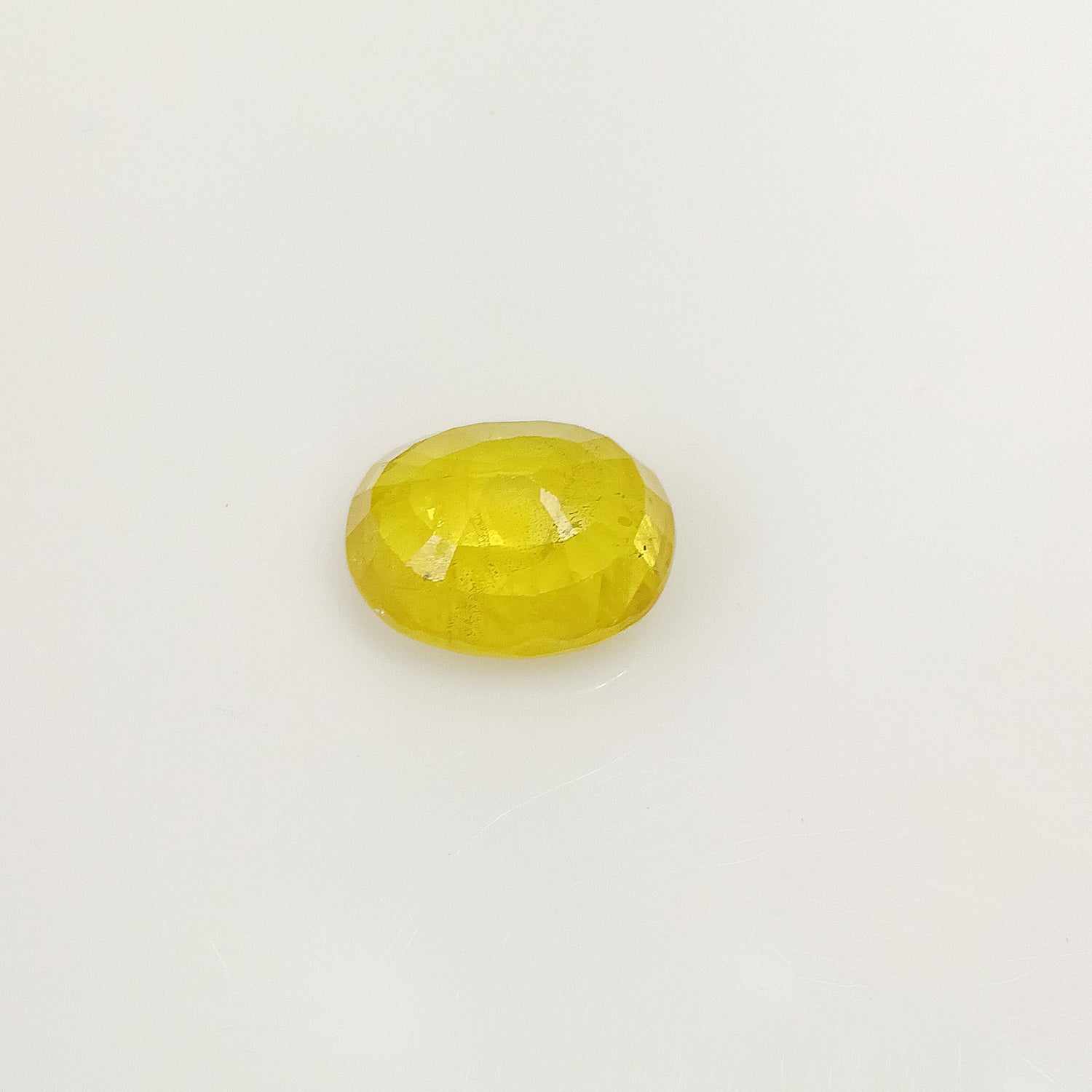Natural Yellow Sapphire (Nigeria) (Heated) Oval Faceted (5.78 Cts. / 6.25 Ratti)