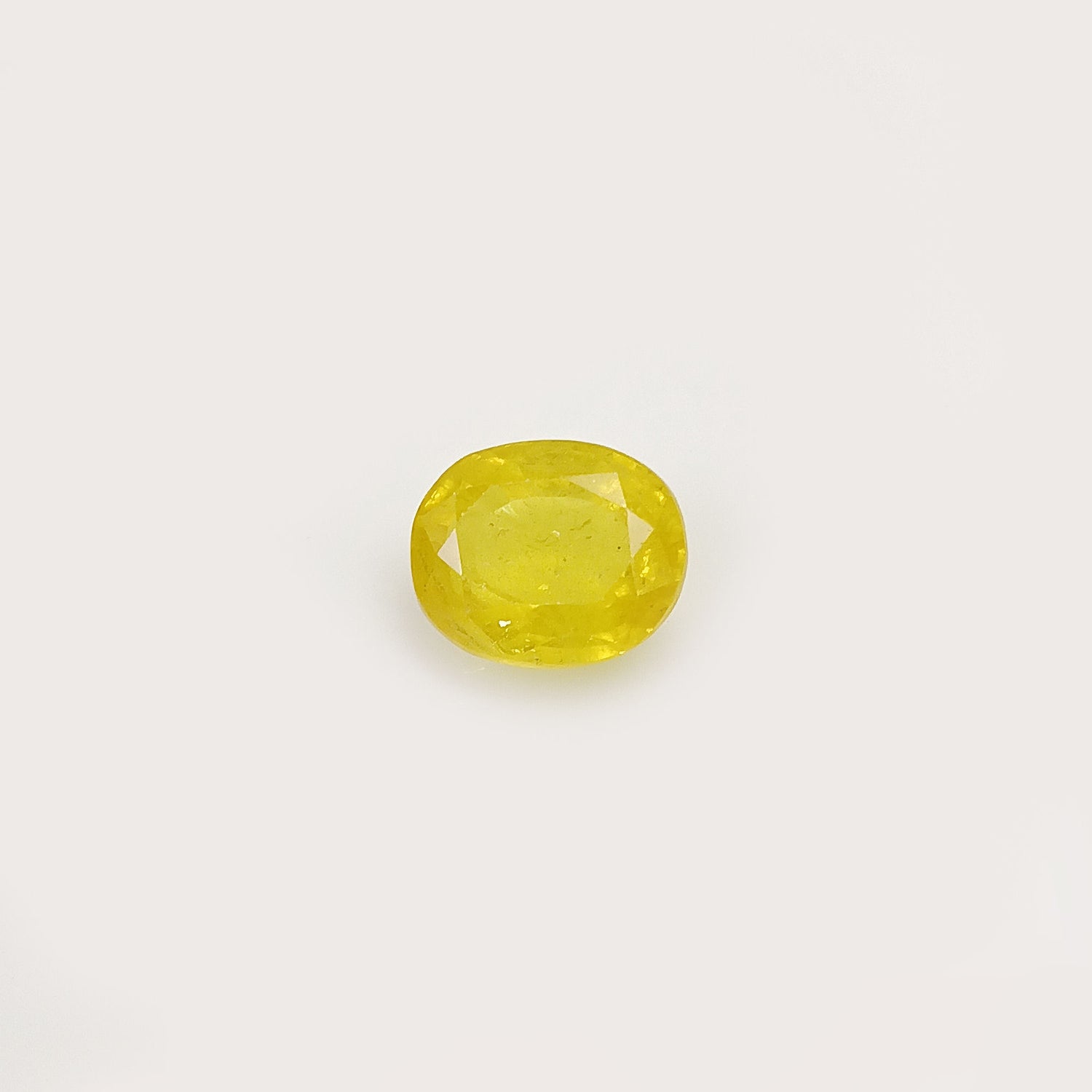 Natural Yellow Sapphire (Nigeria) (Heated) Oval Faceted (5.92 Cts. / 6.50 Ratti)