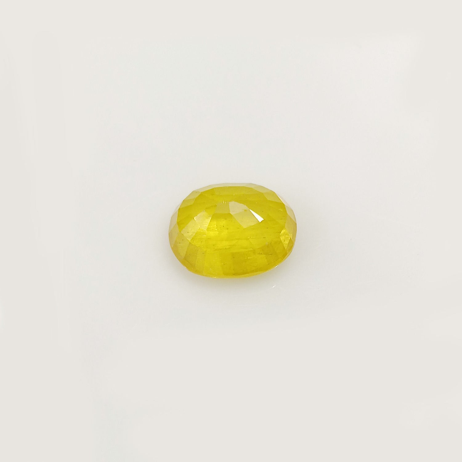 Natural Yellow Sapphire (Nigeria) (Heated) Oval Faceted (5.92 Cts. / 6.50 Ratti)