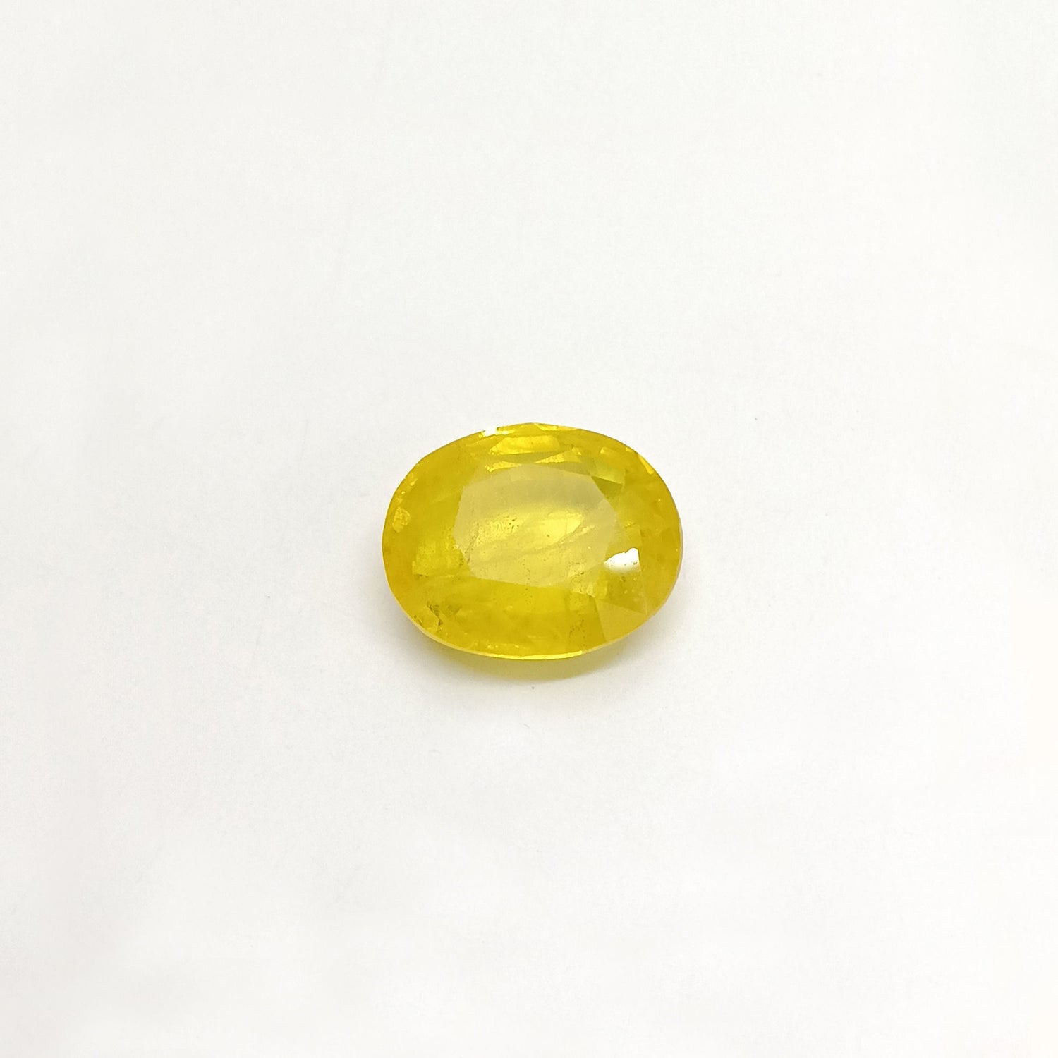 Natural Yellow Sapphire (Nigeria) (Heated) Oval Faceted (5.99 Cts. / 6.50 Ratti)