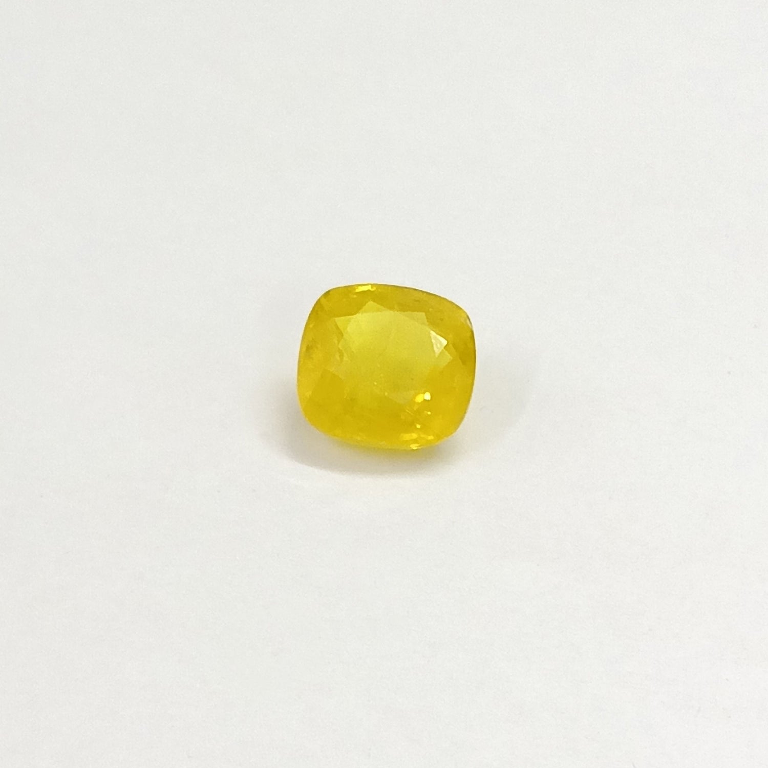 Natural Yellow Sapphire (Nigeria) (Heated) Cushion Faceted (6.09 Cts. / 6.50 Ratti)