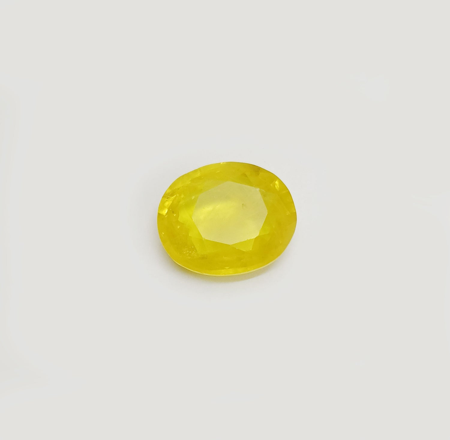 Natural Yellow Sapphire (Nigeria) (Heated) Oval Faceted (6.39 Cts. / 7 Ratti)