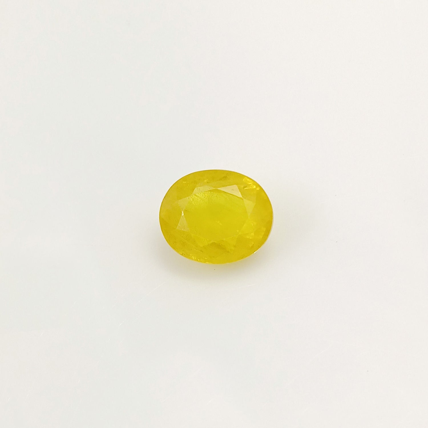 Natural Yellow Sapphire (Nigeria) (Heated) Oval Faceted (6.58 Cts. / 7.25 Ratti)