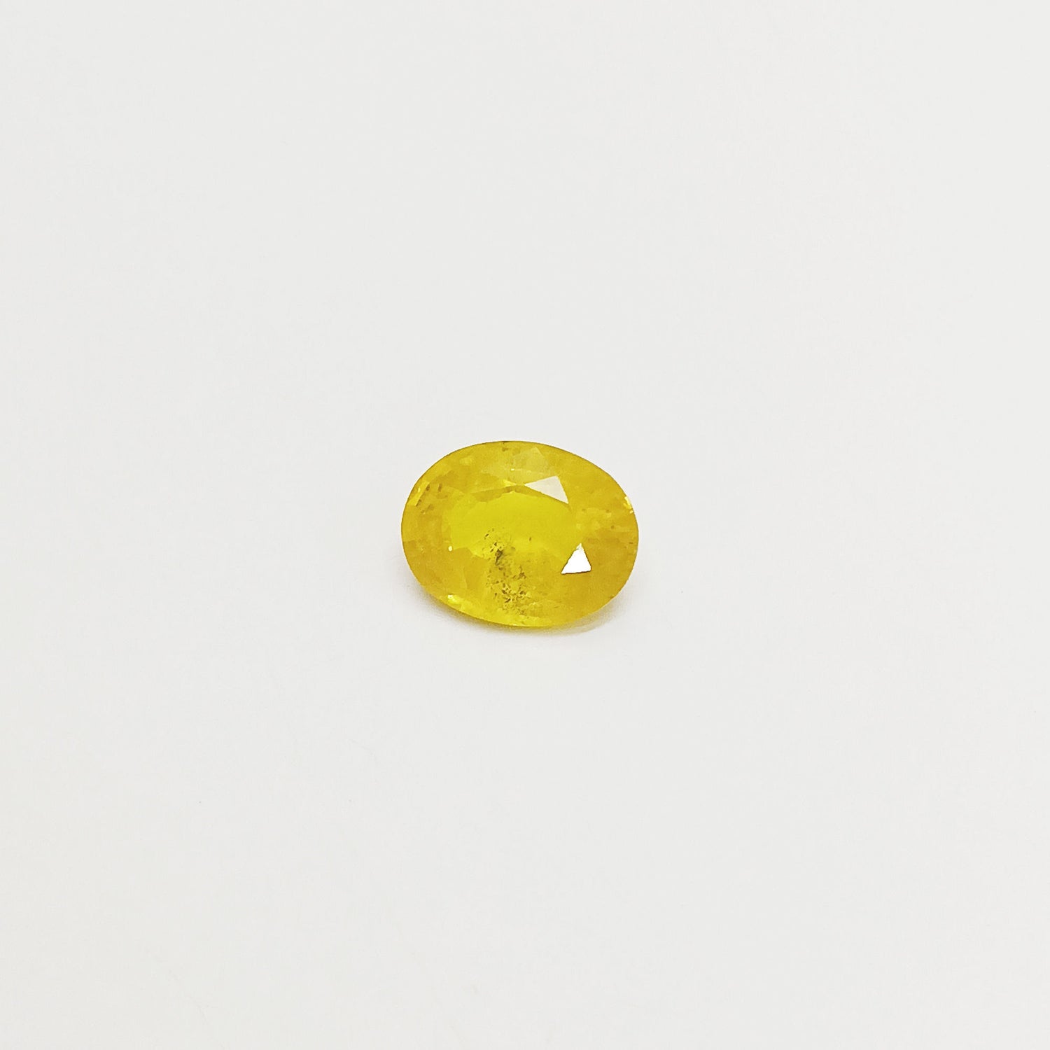 Natural Yellow Sapphire (Nigeria) (Heated) Oval Faceted (6.63 Cts. / 7.25 Ratti)