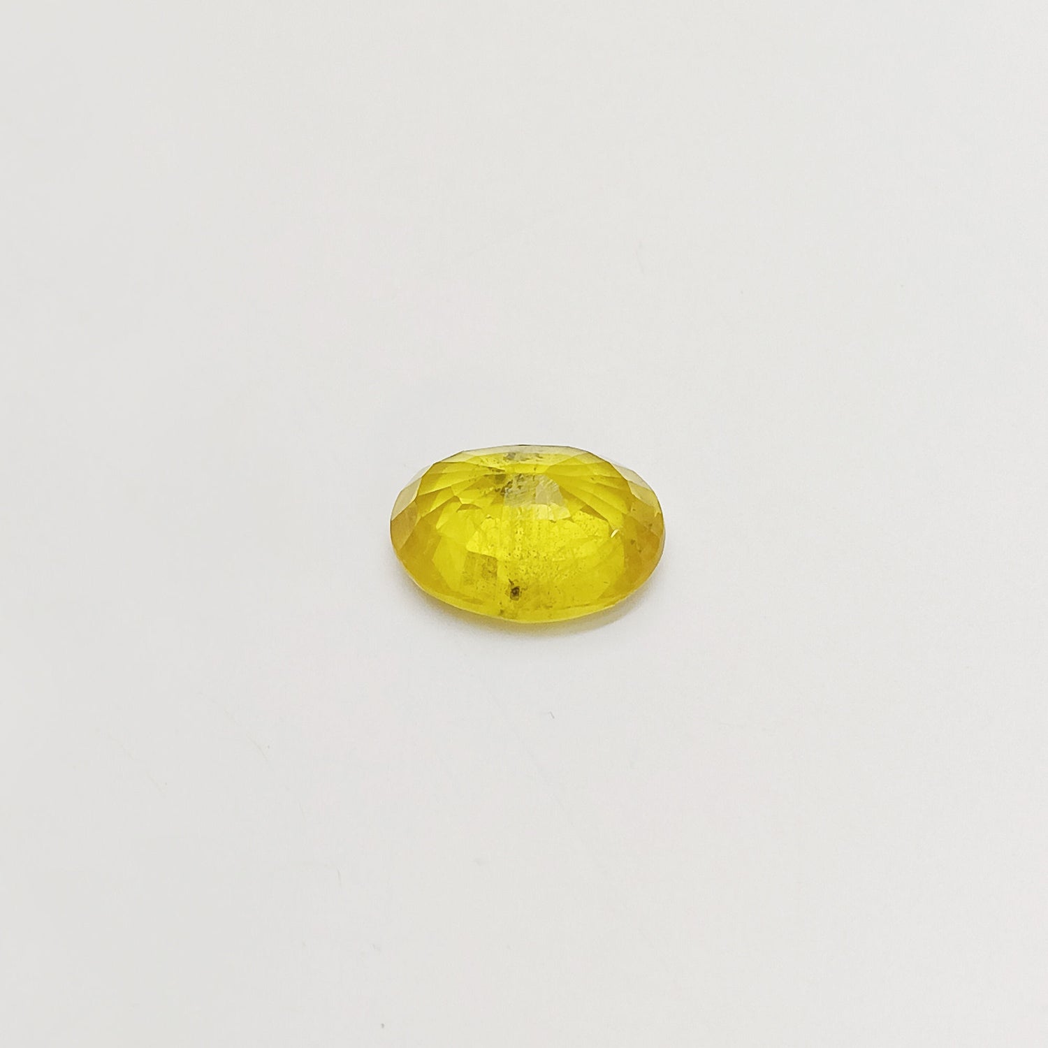 Natural Yellow Sapphire (Nigeria) (Heated) Oval Faceted (6.63 Cts. / 7.25 Ratti)
