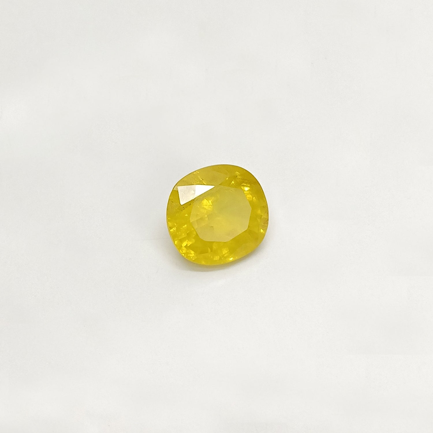Natural Yellow Sapphire (Nigeria) (Heated) Cushion Faceted (6.74 Cts. / 7.50 Ratti)